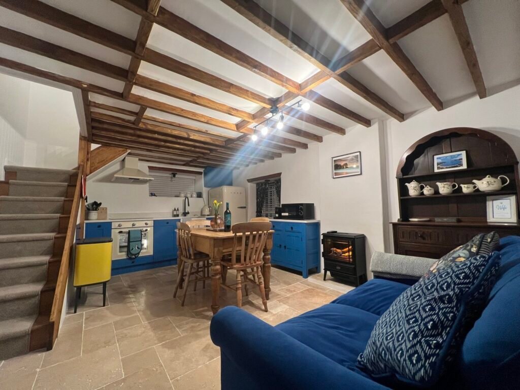The main kitchen dining space in Honeysuckle Holiday Cottage in West Lulworth