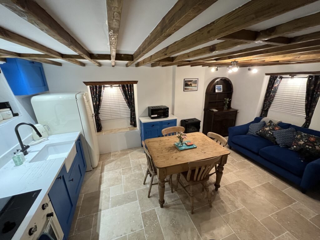 The kitchen and dining space at Honeysuckle Cottage in West Lulworth
